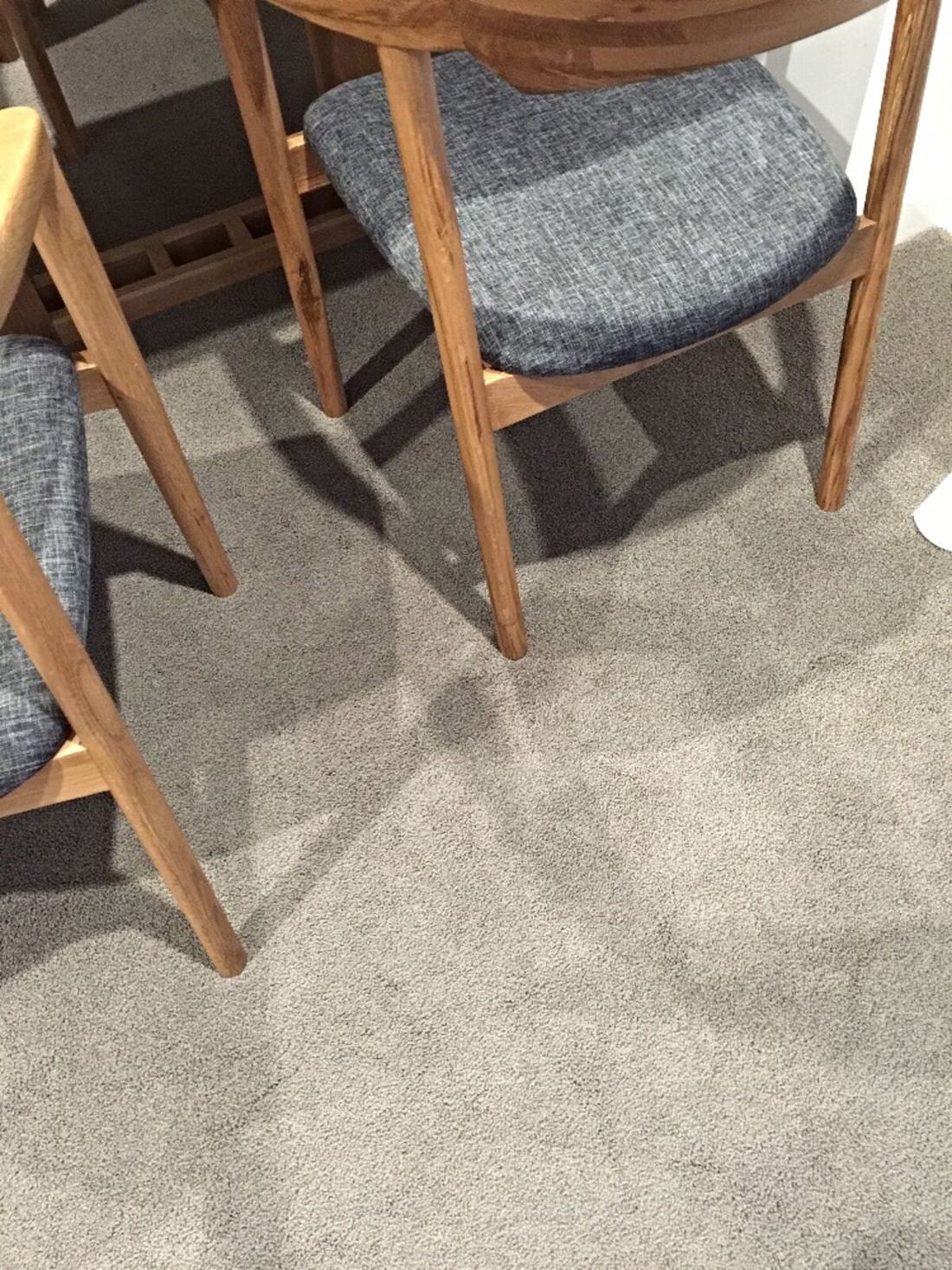 The same dining room carpet with the wine stain removed